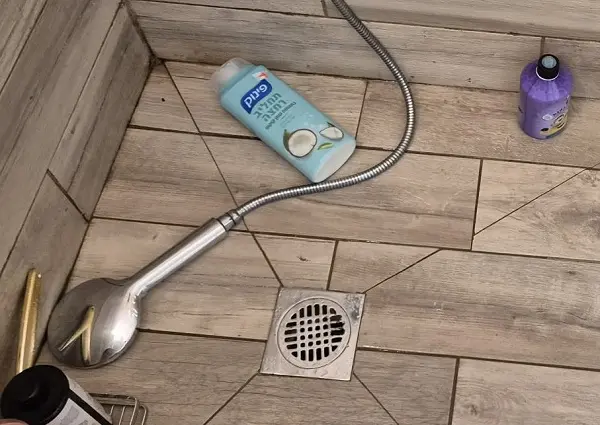 בדיקת ראש מקלחת בעקבות זרם מים חלש